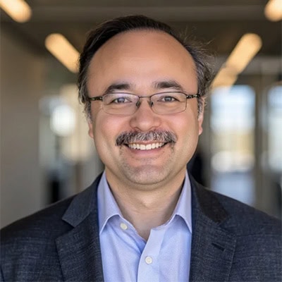 High-quality image of a professional at the SIIM Annual Meeting, showcasing networking and educational opportunities in medical imaging and health IT.