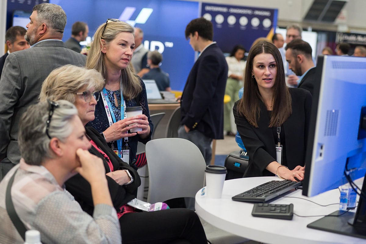 people watching a presentation on a computer