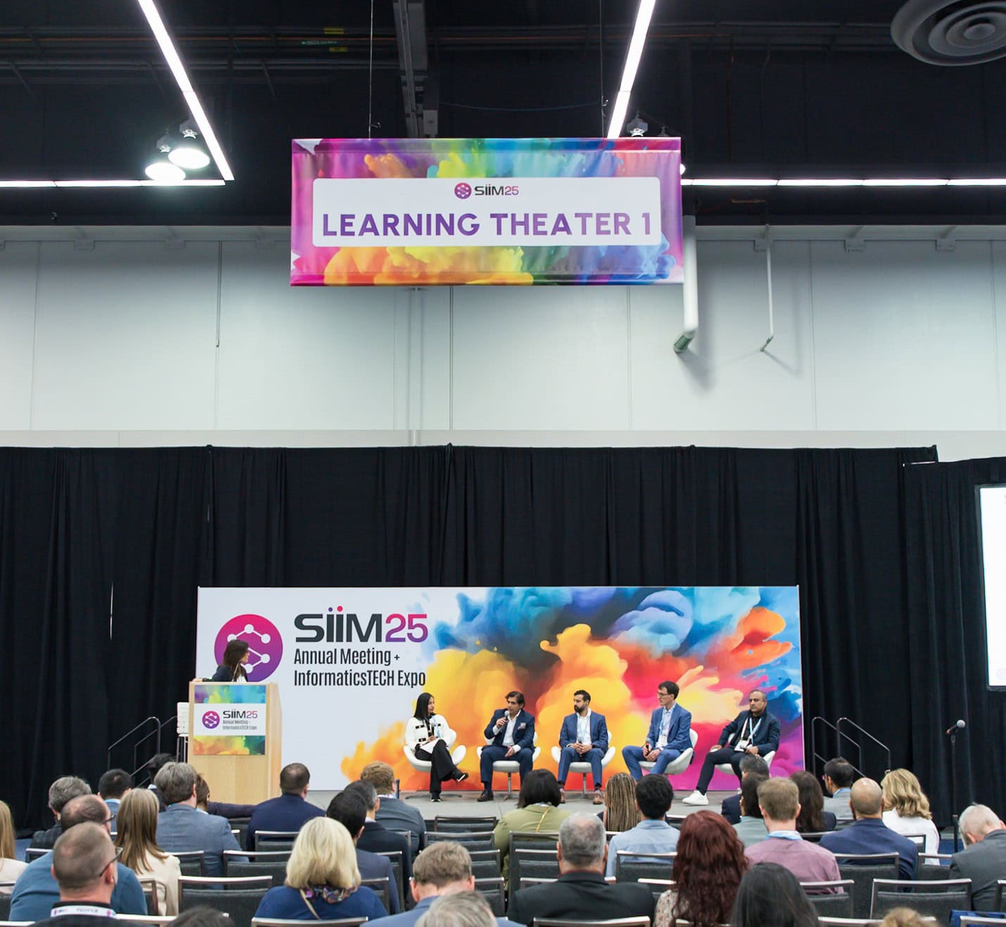 Panel discussion at SIIM Annual Meeting in Learning Theater 1, featuring industry experts on medical imaging and informatics.