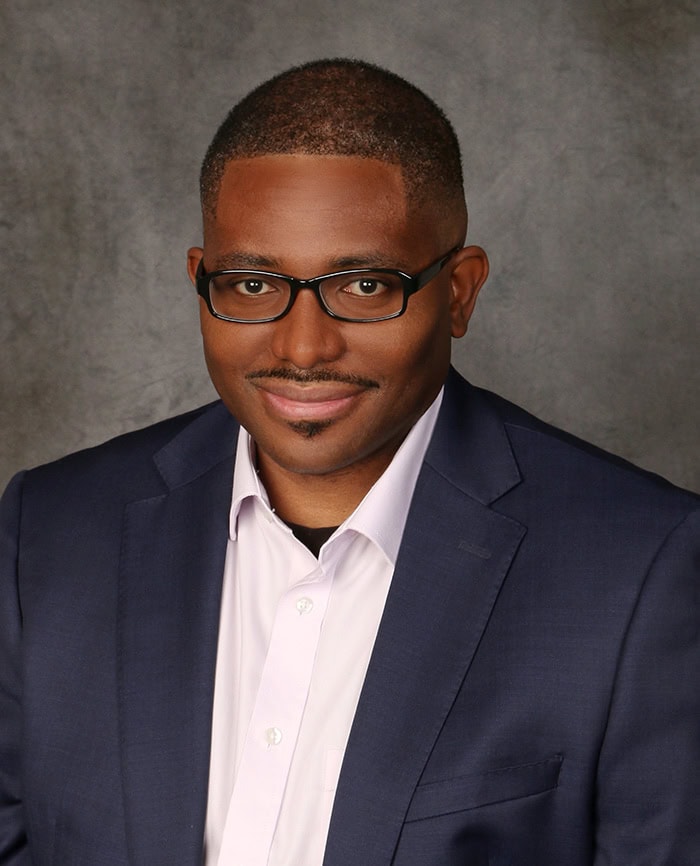 Dr. Ronnie Sebro, a distinguished radiologist and researcher, speaking at the SIIM Annual Meeting about advancements in medical imaging and AI technology.