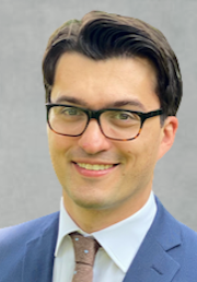 Dr. Lev Barinov, MD, PhD, speaking at the SIIM Annual Meeting 2023, showcasing innovative medical imaging and informatics solutions.