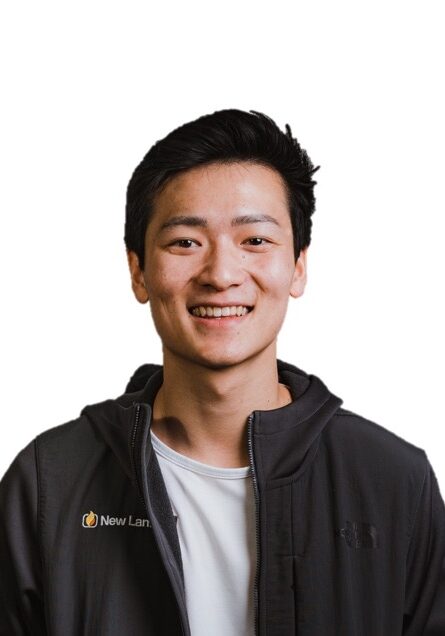 Ryan Chen smiling at the SIIM Annual Meeting, wearing a black jacket with SIIM logo.