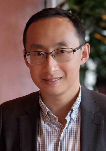 Dr. David Chen, a leading radiologist, presenting at the SIIM Annual Meeting, showcasing advancements in medical imaging technology and AI-driven diagnostics.