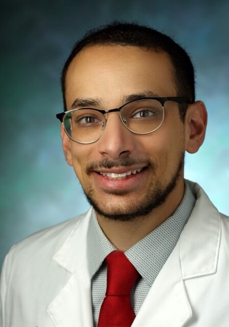 Dr. Peter Kamel, MD, attending the SIIM Annual Meeting, presenting on innovative medical imaging techniques.