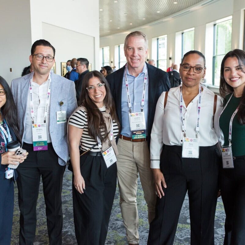 Diverse group of professionals attending the SIIM Annual Meeting, connected through medical imaging and healthcare technology, showcasing networking and collaboration at the radiology and informatics conference.
