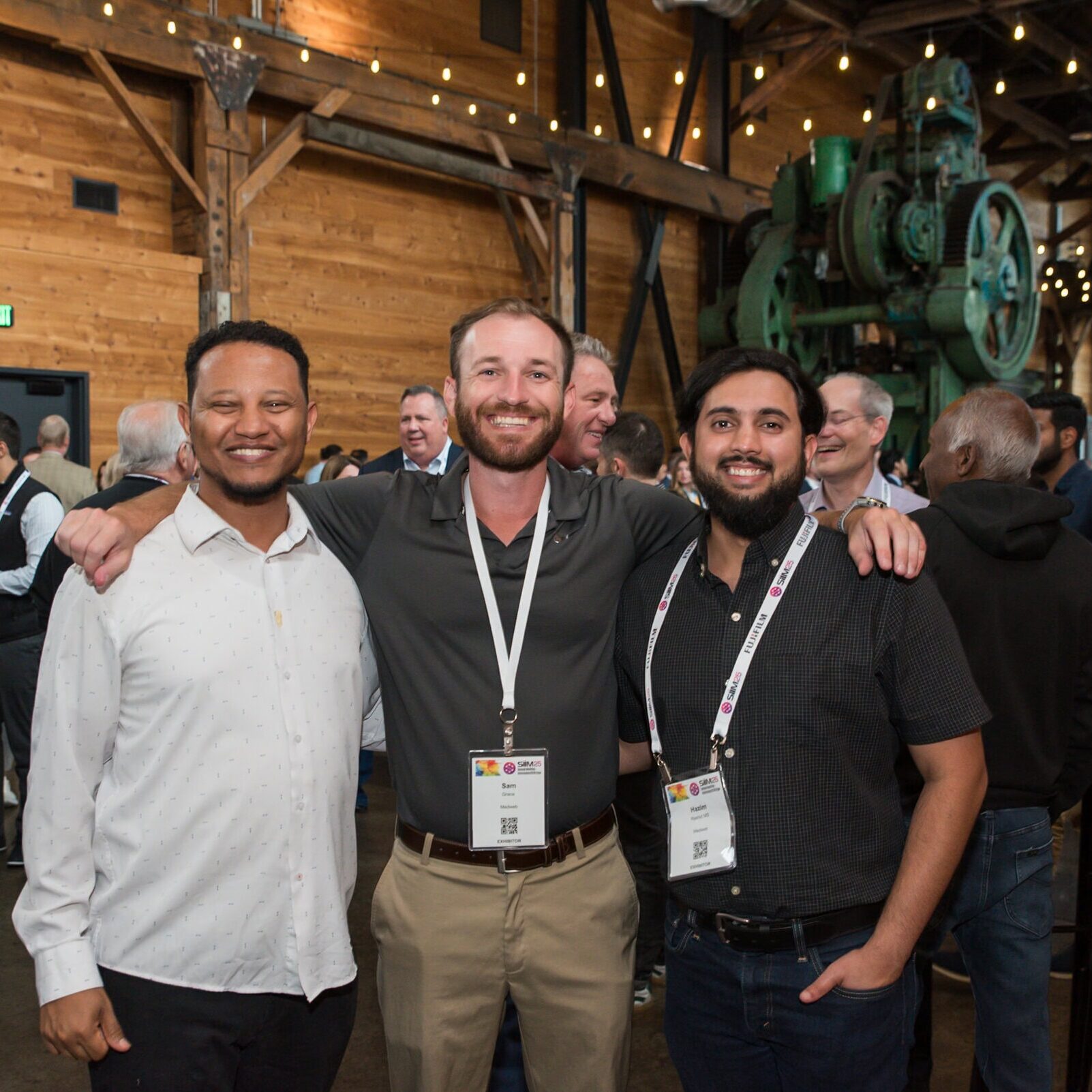 Innovative Medical Imaging Conference at SIIM Annual Meeting with diverse healthcare professionals networking in a rustic venue.