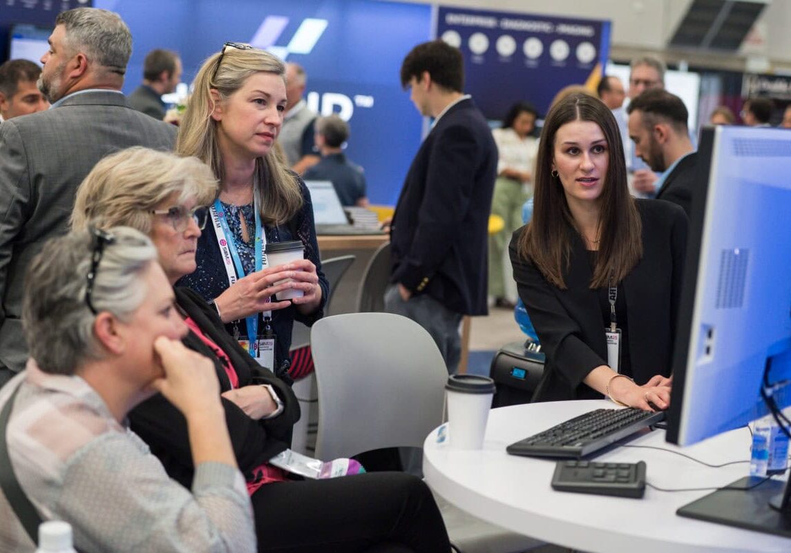 Advanced medical imaging professionals engaging at the SIIM Annual Meeting, showcasing innovative radiology technology, networking, and professional development in medical imaging.