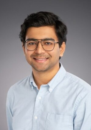 Professional portrait of Gustavo Lischinsky Moreno, attendee at the SIIM Annual Meeting, showcasing a friendly smile, glasses, and business casual attire.