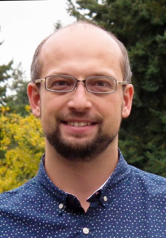 Modern medical professional at SIIM Annual Meeting, showcasing advancements in imaging and radiology technology, with a focus on innovation, collaboration, and education in medical image informatics.