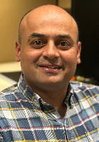 Innovative medical professional attending SIIM Annual Meeting, showcasing advancements in imaging technology and healthcare solutions at the leading radiology and medical imaging conference.