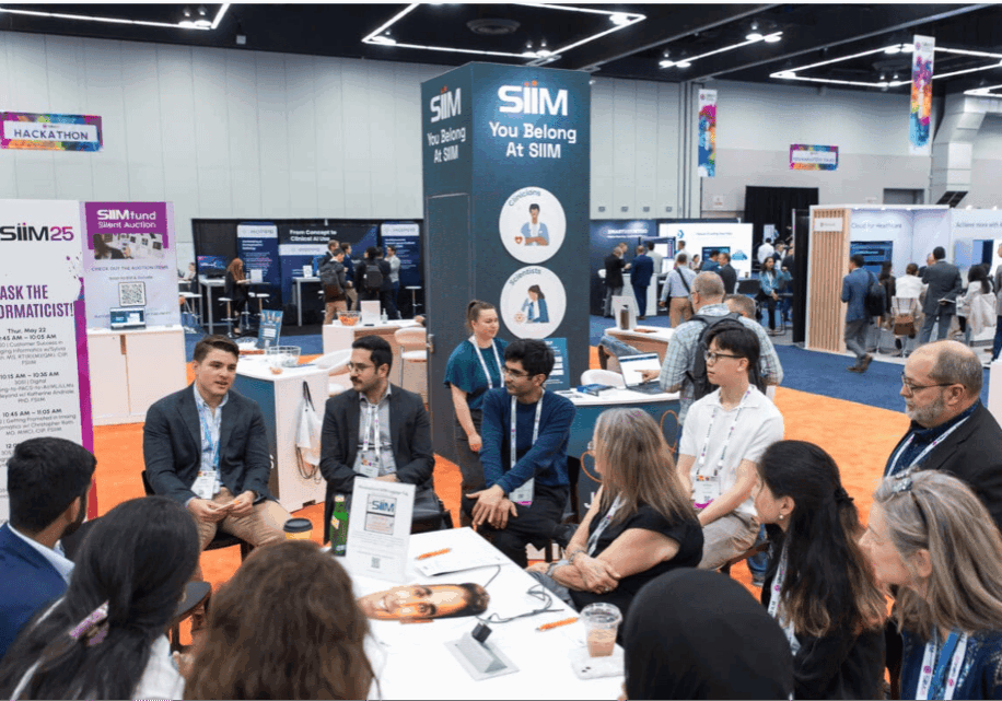 AI-powered medical imaging technology dialogue at SIIM Annual Meeting, radiology conference focusing on health IT, AI in radiology, and medical imaging innovations.